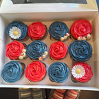 Box of cupcakes with red, white, and blue frosting